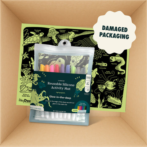 HeyDoodle Australia Classic silicone mat featuring glow-in-the-dark deep sea creatures, with damaged packaging and a clear pouch containing colouring markers.