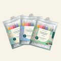 Three HeyDoodle Speechie Mat reusable silicone learning mats shown in individual pouches, each accompanied by colorful markers featuring phonics activities for T, S, and K sounds designed for speech practice and creative colouring.