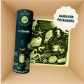 A cylindrical container and a square deep-sea themed Mini Mat (Damaged packaging) inside a shipping box with second chance packaging defects.