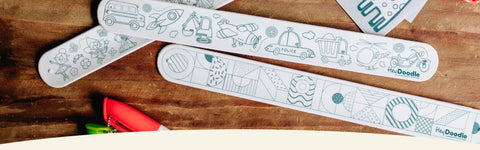 sketchbands lay flat on a wooden table